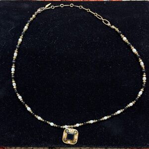 Elegant Gold and Black Pendant Necklace